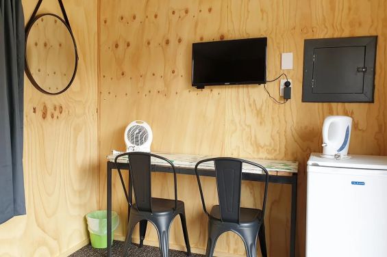 Tourist Cabins - TV and table